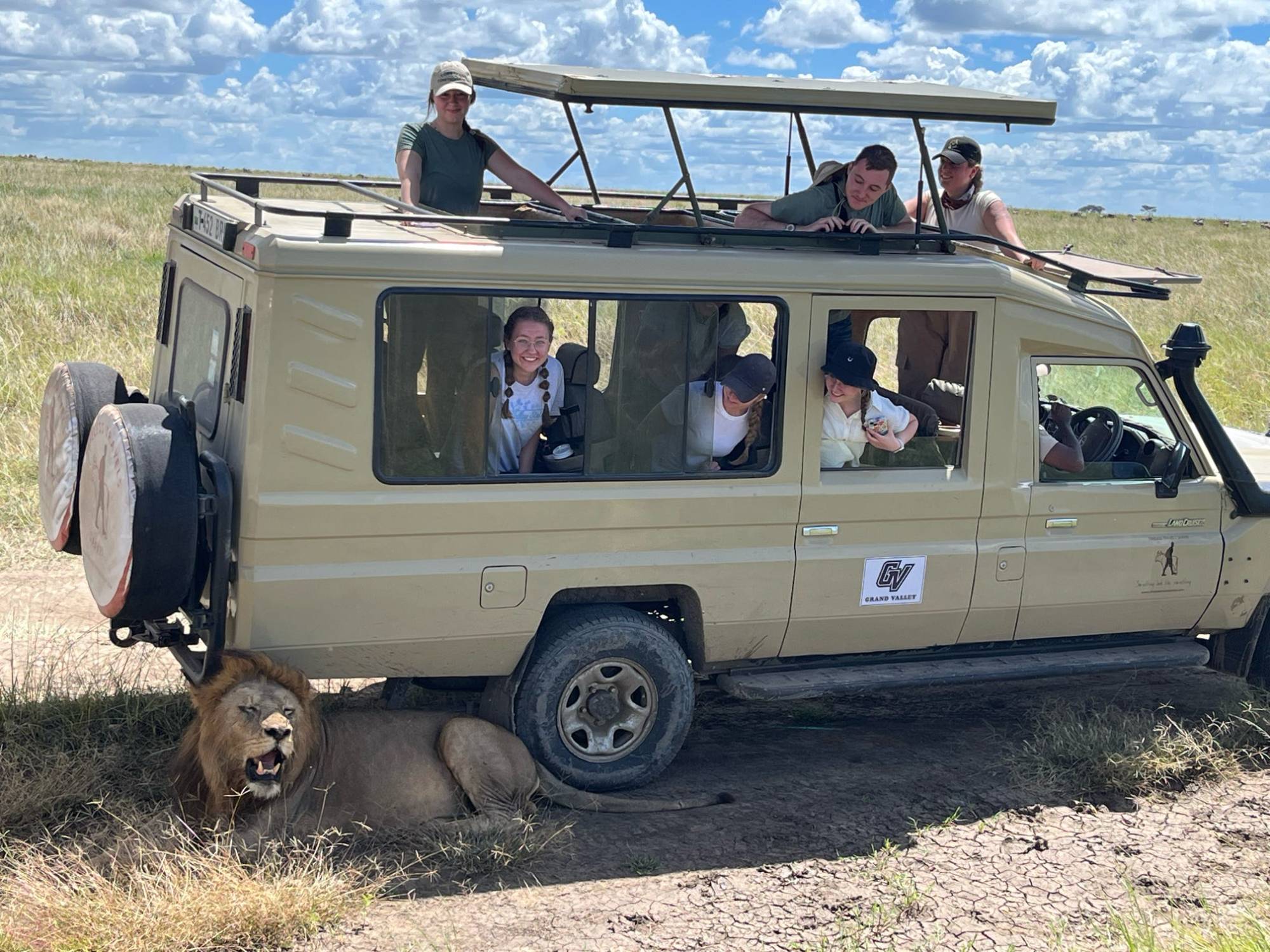 A picture of students on a safari in Tanzania.